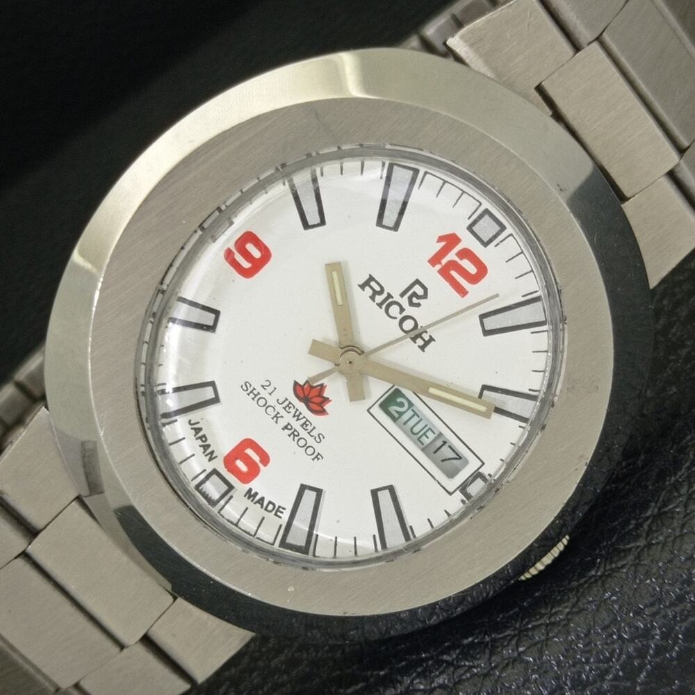 Vintage 1972 Ricoh Automatic Mens Silver Watch W/daydate & Red accents